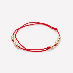 MISHA RED STRING BRACELET