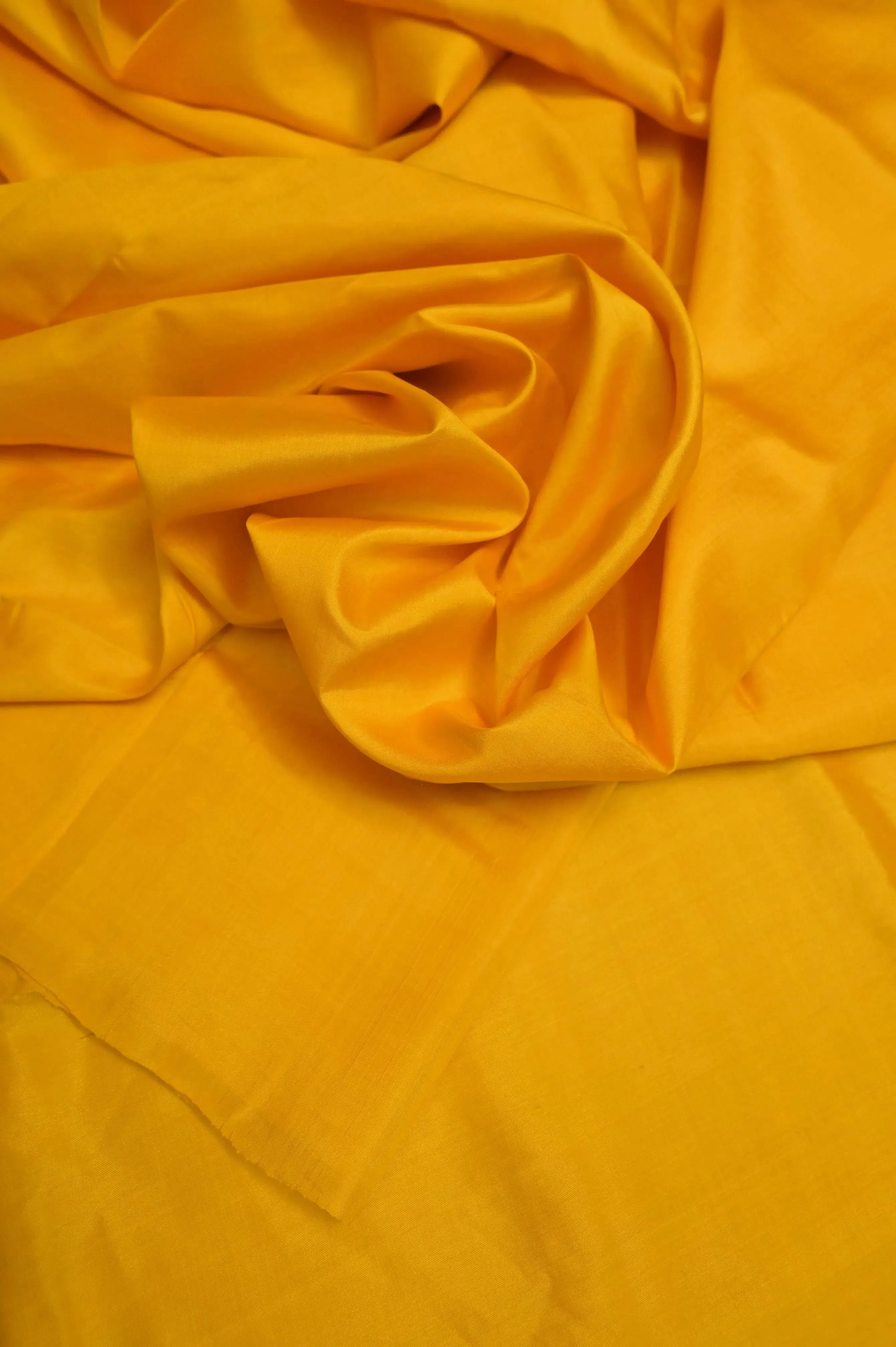 Turmeric Yellow Color Pure Bishnupur Katan Silk Saree with Hand Batik Blouse Piece